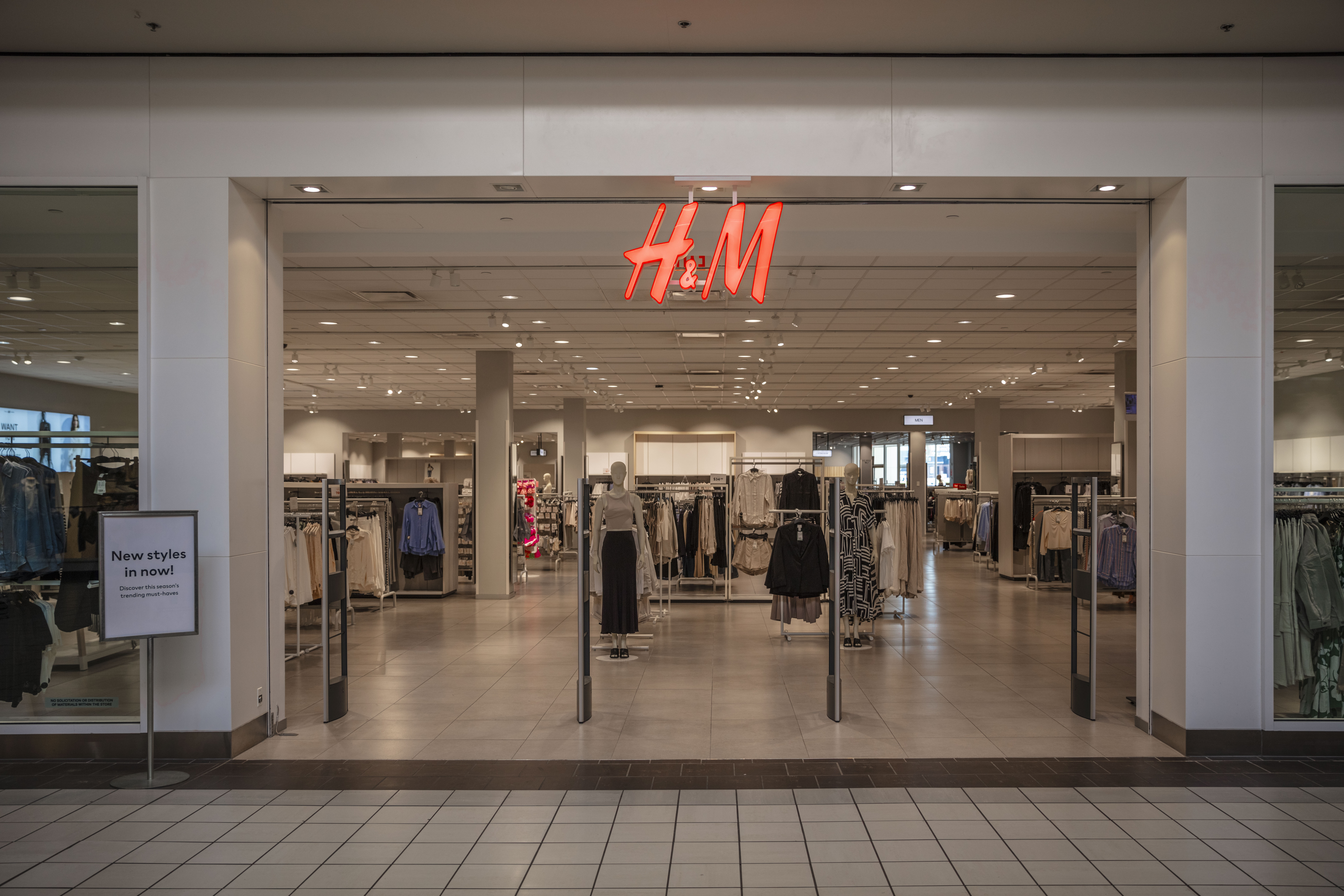 H&M storefront inside Golden Triangle Mall featuring affordable fashion apparel and accessories for men, women, and children.